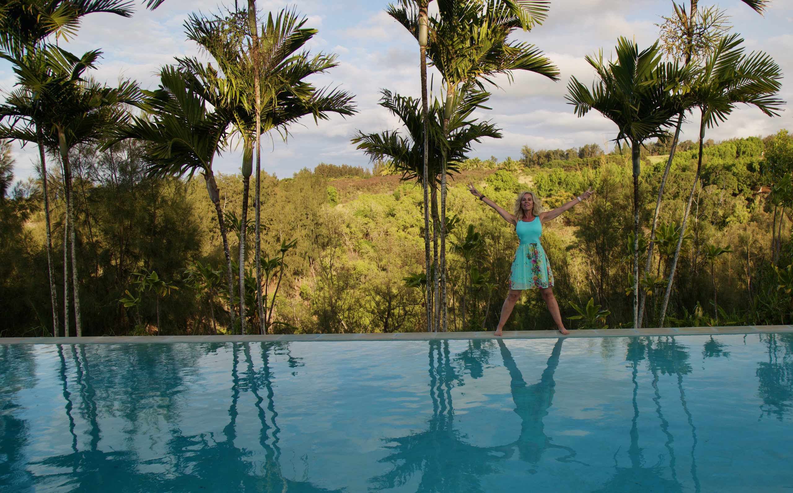 Yoga Student in Star Pose by the Pool in Costa Rica