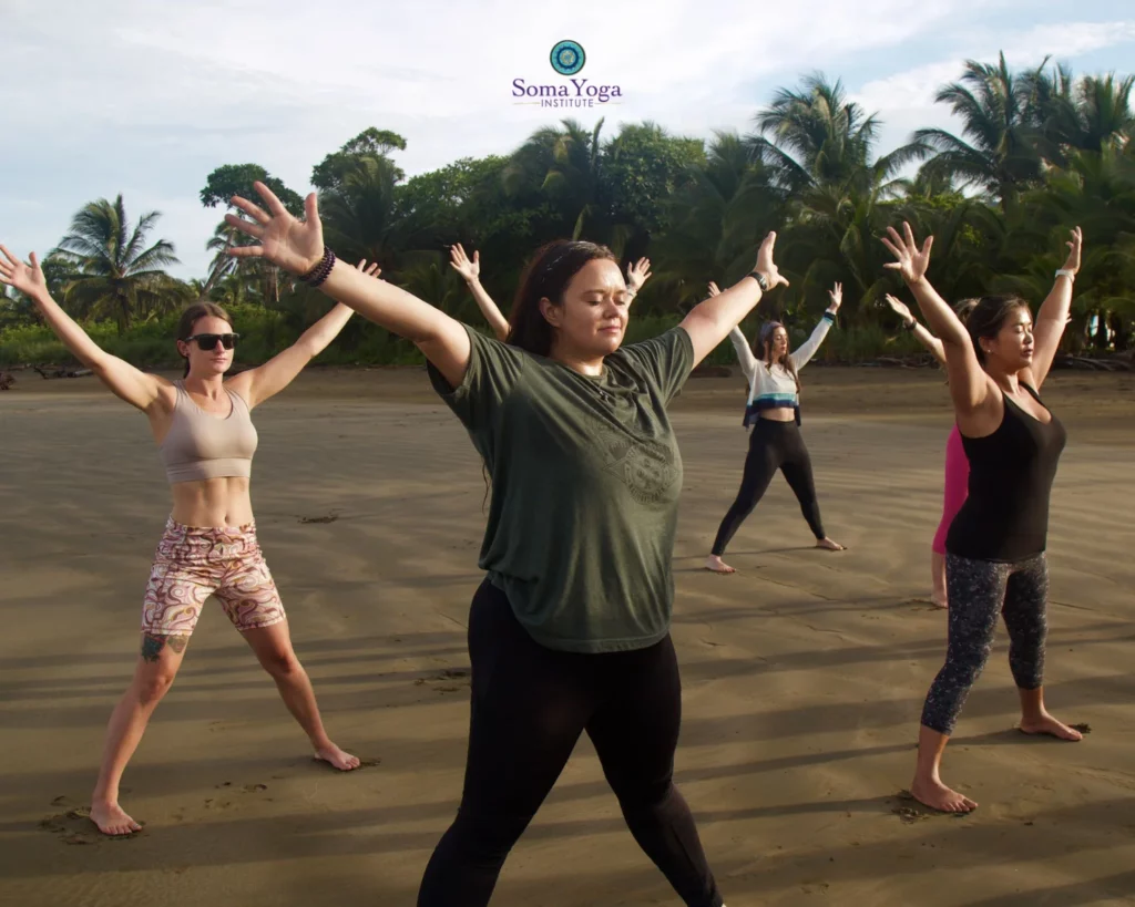 Practice yoga on the beach in yoga training with Soma Yoga Institute in Costa Rica