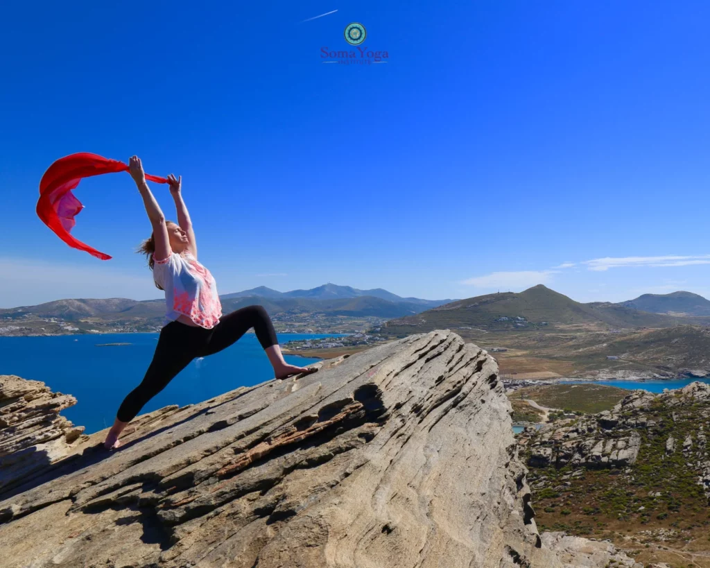Practicing Yoga in the stunning landscapes of Yoga Teacher Training in Greece