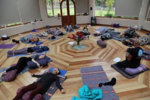 Students enjoying Yoga Nidra during a 300-Hour Yoga Teacher Training with Soma Yoga Institute
